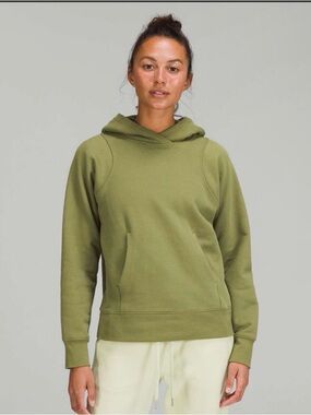 Lululemon Olive green hoodie with a relaxed fit size 8🪐